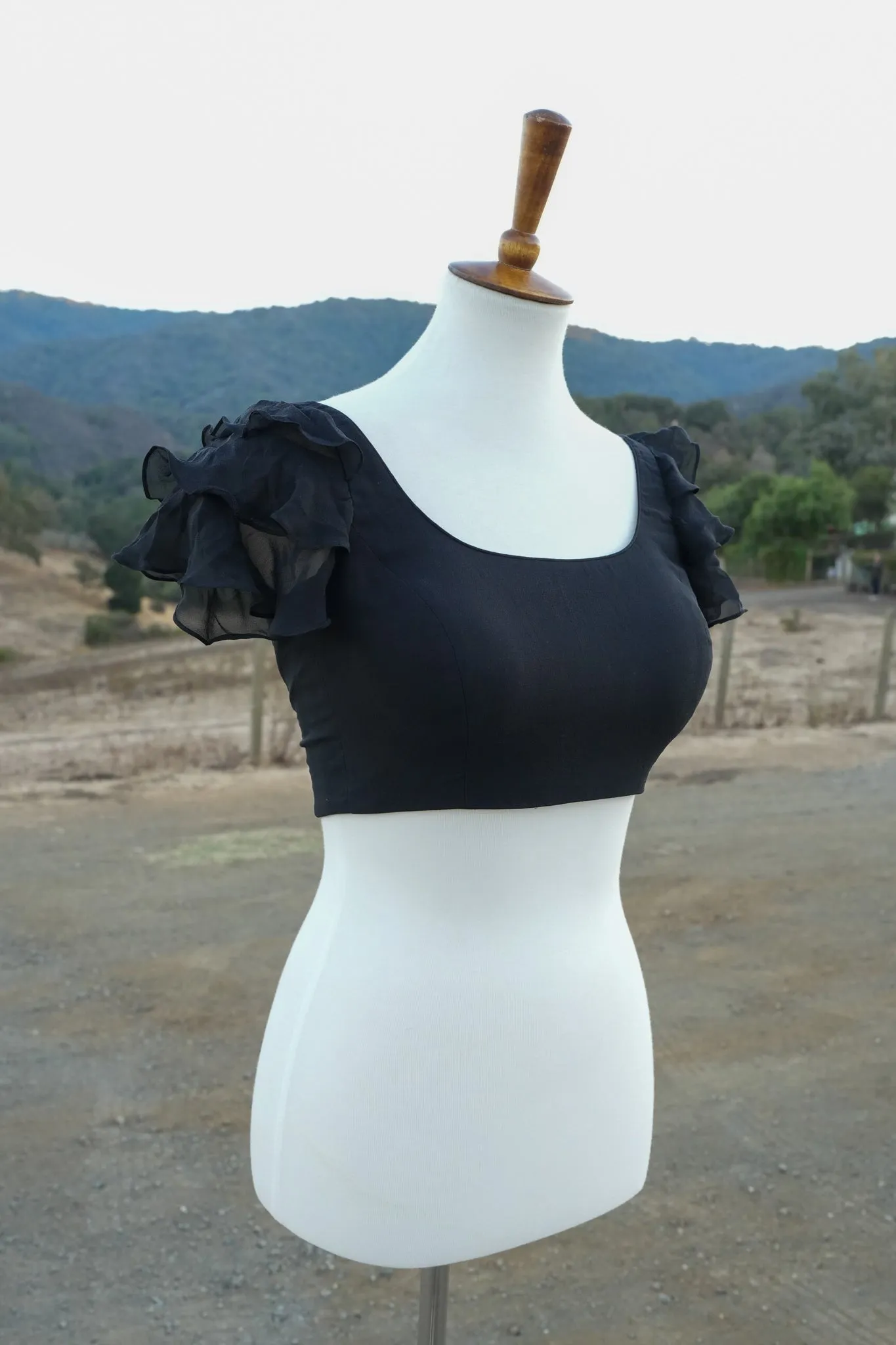 Black ruffle blouse