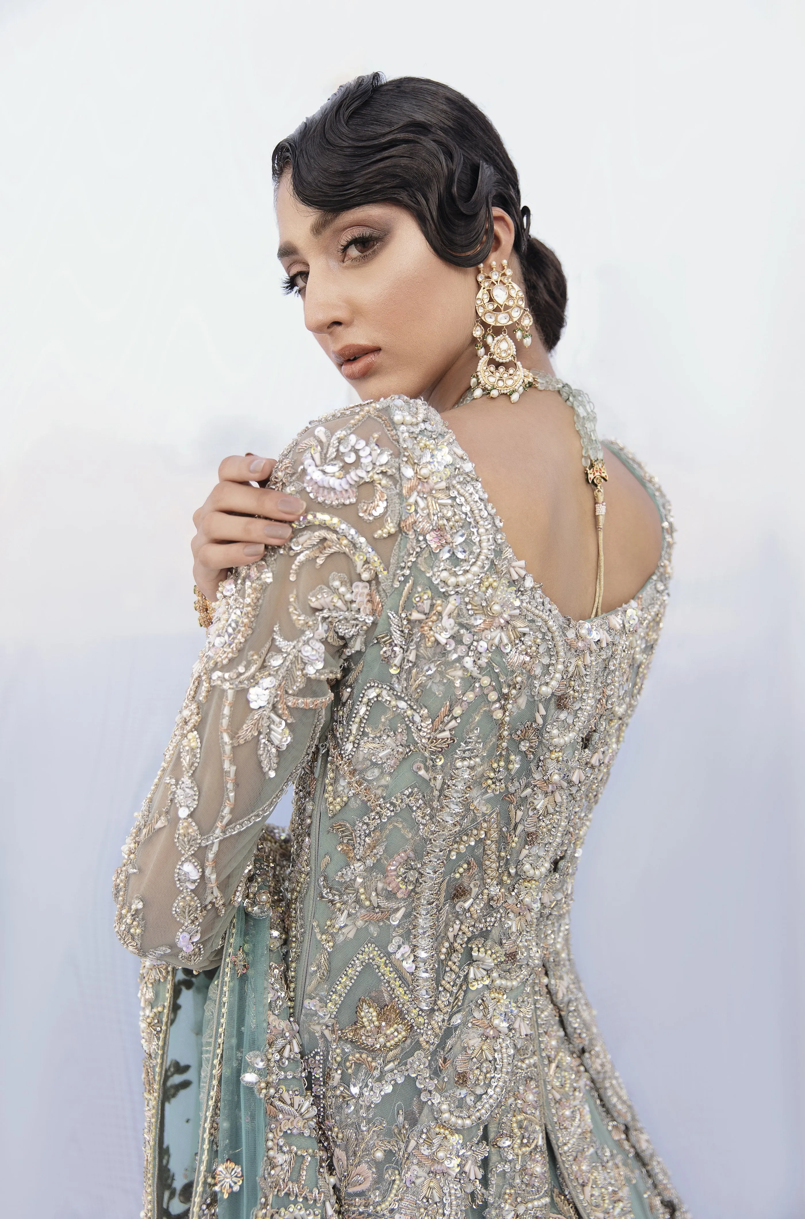 Pakistani Bridal Lehenga Designs in Embellished Heavy Hand Needle Work for Wedding Wear in Silver Sequin Lehenga in Long Gown #BN942