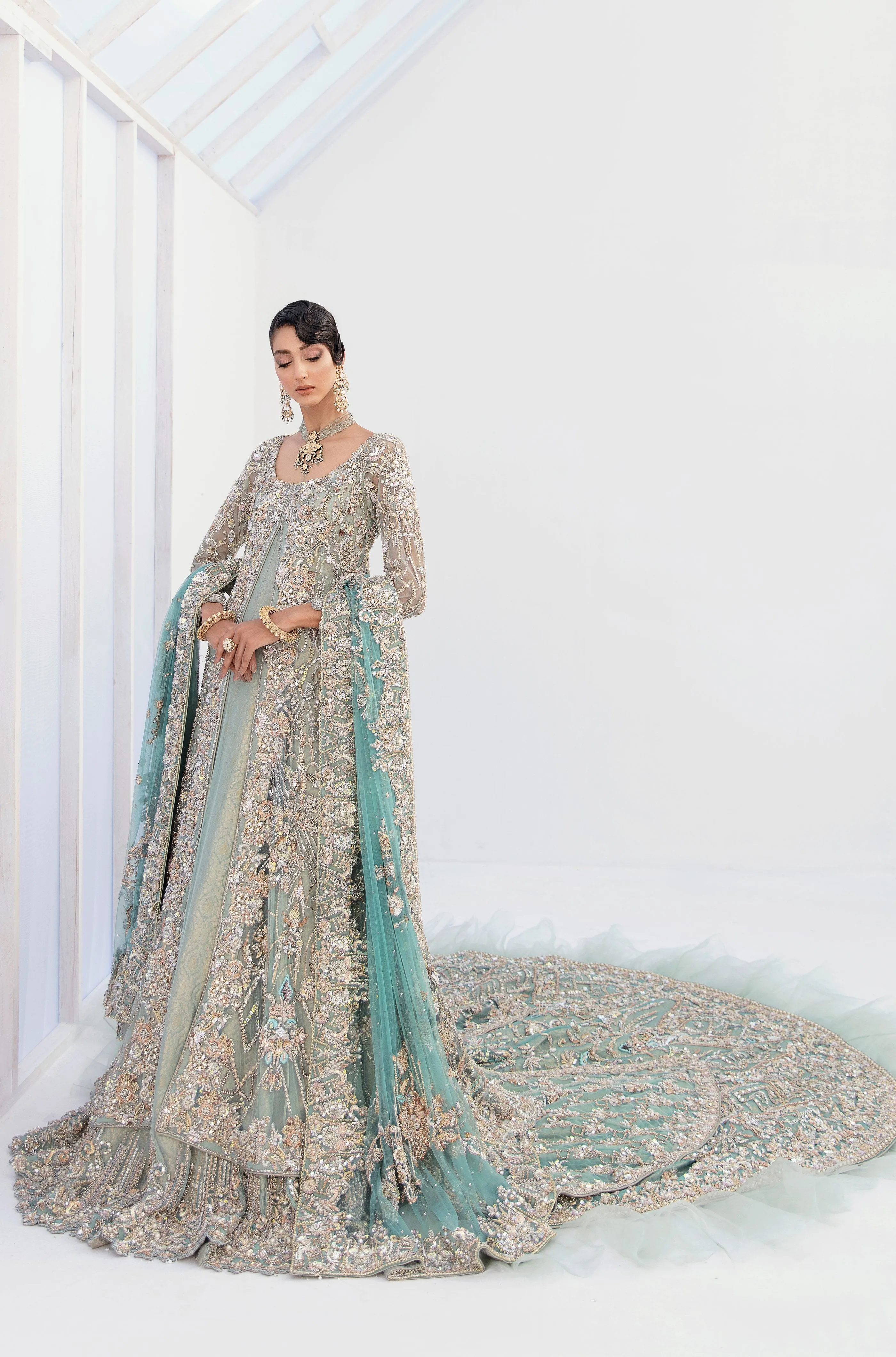 Pakistani Bridal Lehenga Designs in Embellished Heavy Hand Needle Work for Wedding Wear in Silver Sequin Lehenga in Long Gown #BN942
