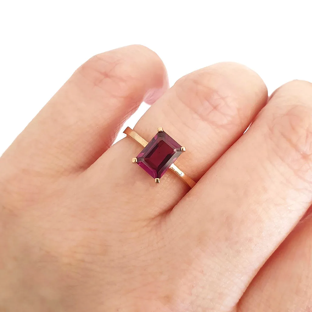 Solitaire Four Claw Emerald Cut Grape Garnet Ring