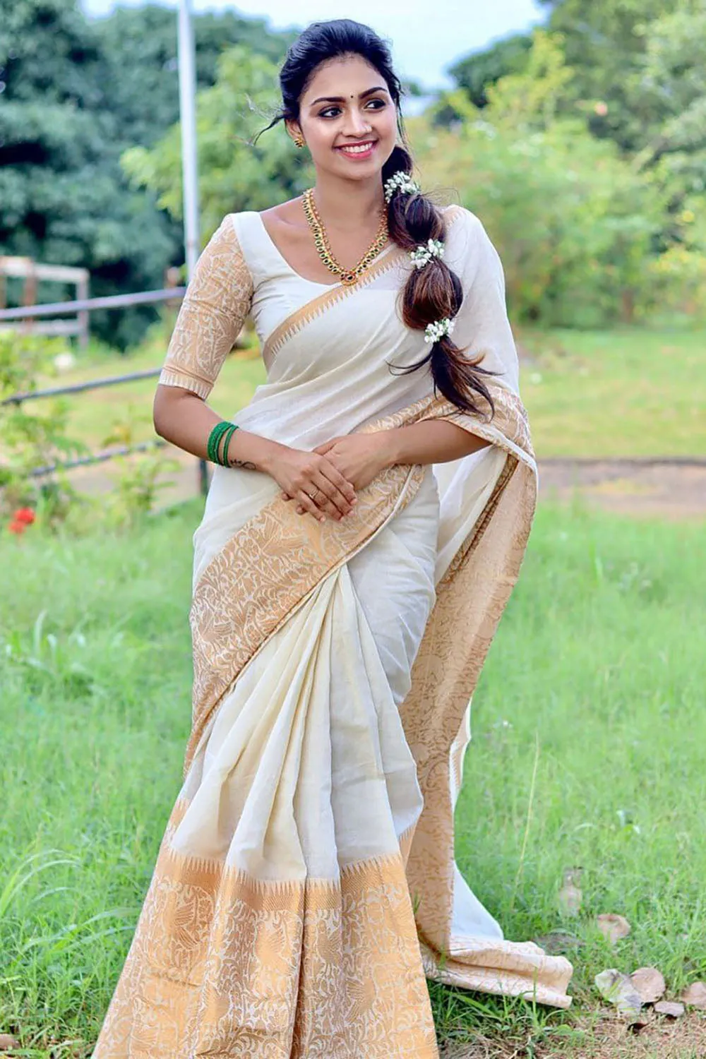White Silk Saree With Zari Weaving Work